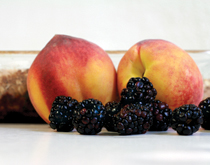 Image of peaches and blackberries for the June 2012 recipe
