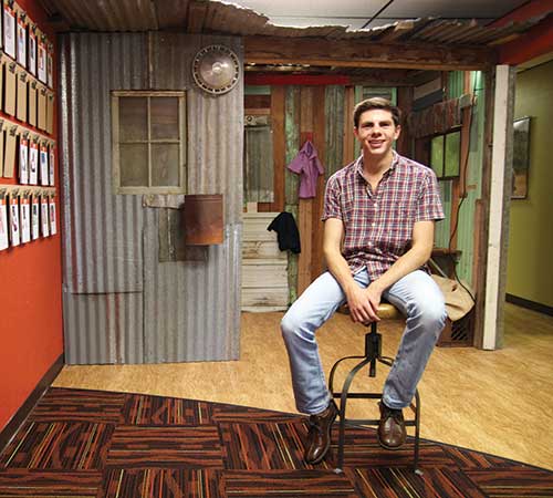 Ben Brinkerhoff sitting on stool