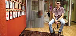 Ben Brinkerhoff sitting on a stool