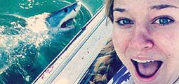 Riley Shugg snaps a selfie with a shark
