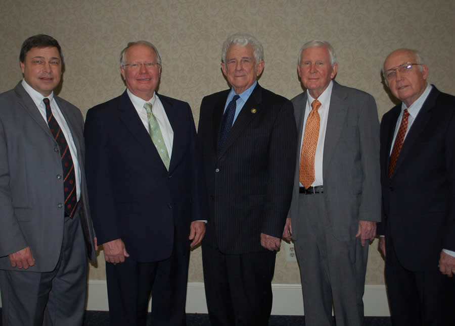 Five men standing together